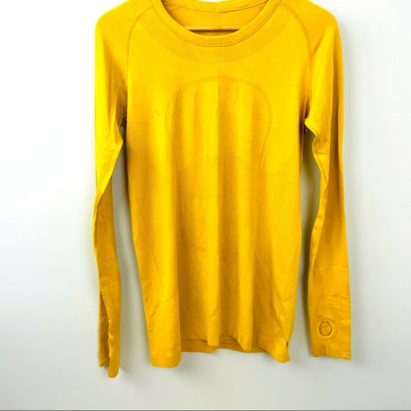 NWOT Mustard yellow Lululemon Swiftly Tech shirt!